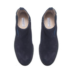 Pair of navy wide fit blue suede chelsea boots on a white background